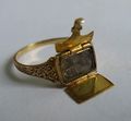 The 1881 envelope mourning ring showing how it opened to allow hair to be put inside as a keepsake.jpg